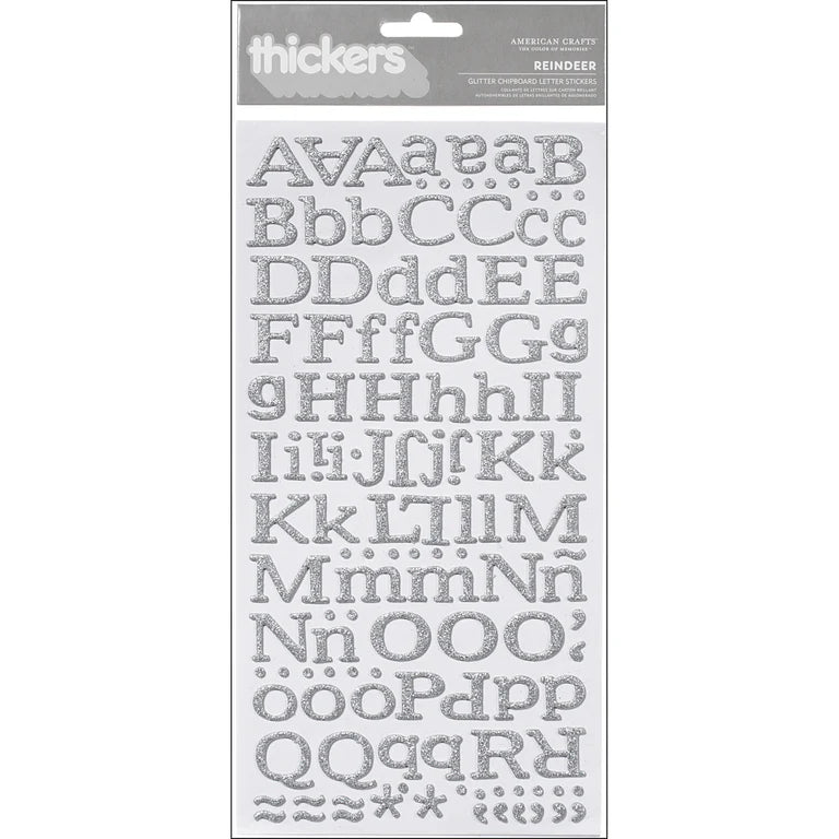 Sheet of glittery uppercase letters with packaging on a white background