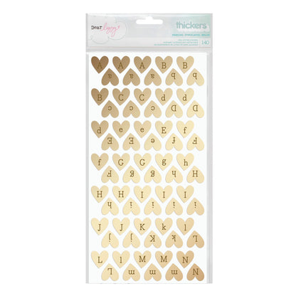 Heart-shaped letter stickers with &