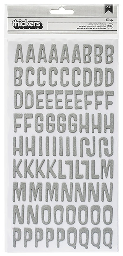 Alphabet letter stickers on a white background with &