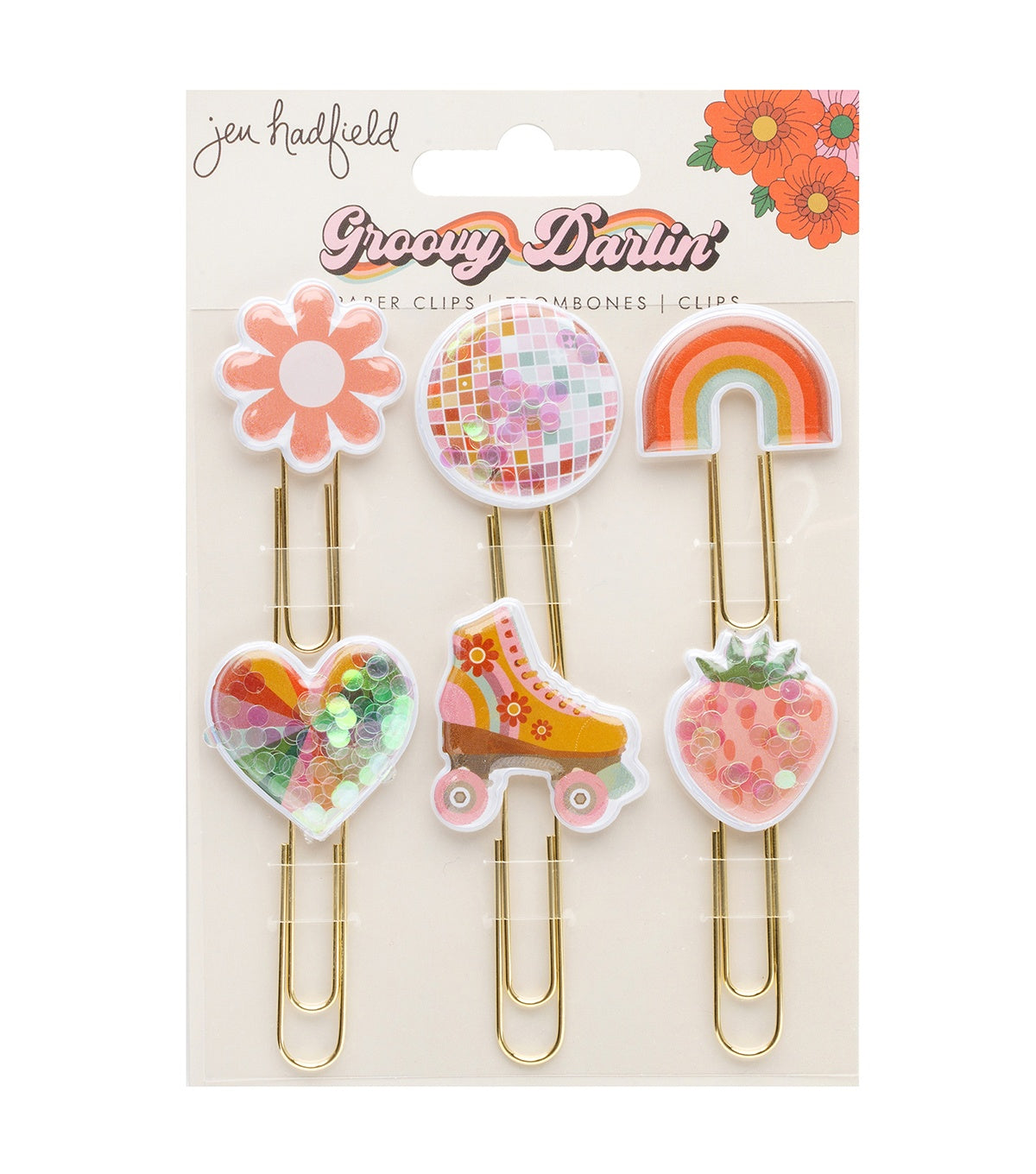 Set of colorful paper clips with decorative designs on a Groovy Darlin&